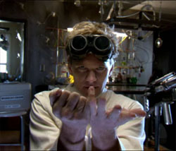 Dr. Horrible (Neil Patrick Harris) does some weird thing with his fingers to freak out his blog viewers.