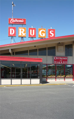 The bustling Ostrom's Drugs enjoys swift business in its current high-traffic location.